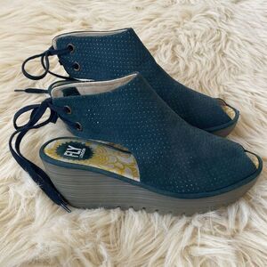 Fly London Lace-up Leather Bootie/sandals, clean soles. A few times.